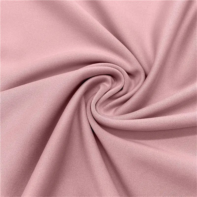 Polyester spandex fabric showing a smooth stretch-knit surface